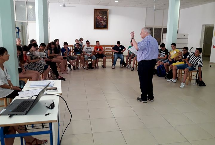 John Barnes from ESU Gozo speaks to children